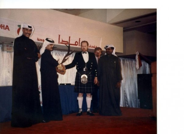 Presenting a gift of a wall mounted 12 point Stag antlers to Qatar Motor Sports Club 1992.